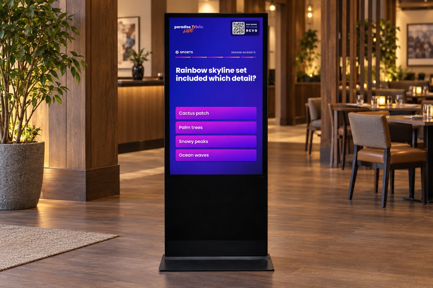 A freestanding portrait screen in a restaurant, running Paradise Trivia Live.